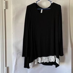 Black long sleeve tunic with white lace hem